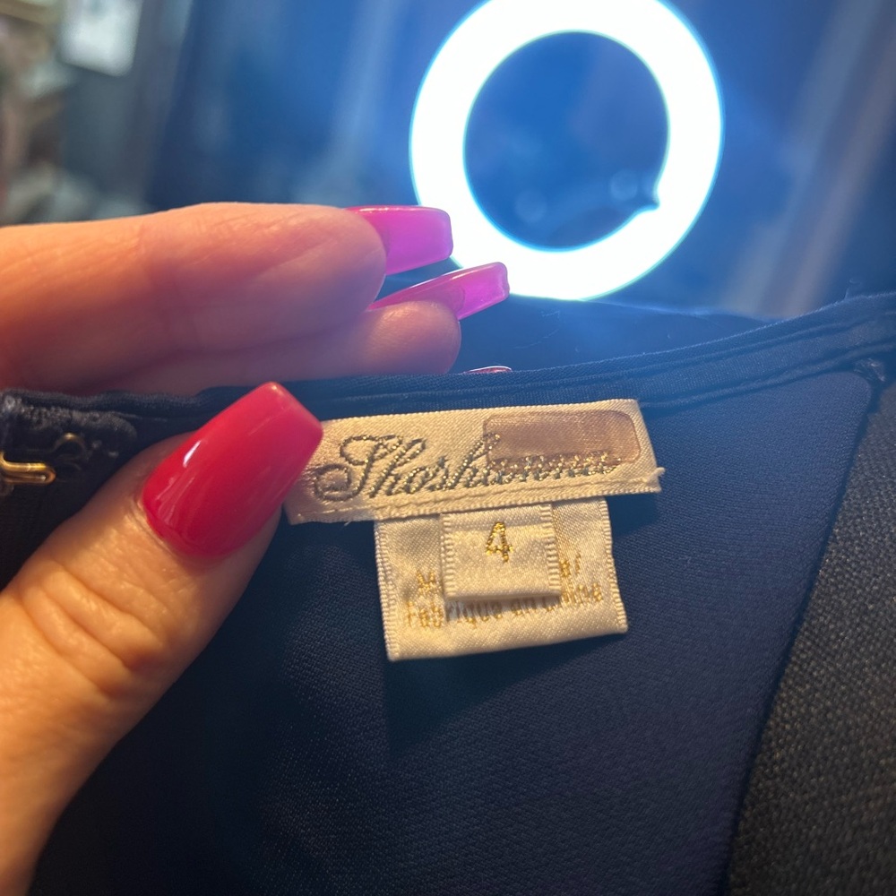 Elegant Navy Blue Dress with White Accents - Picture 8 of 13